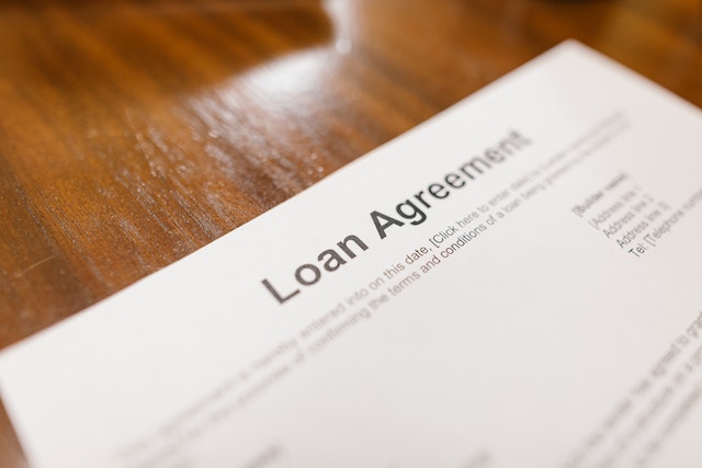 Close Up Photo of an Loan Agreement on a Paper